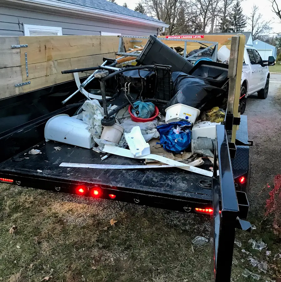 Roll-off dumpster delivered to a residential driveway in Rainbow Lakes Estates